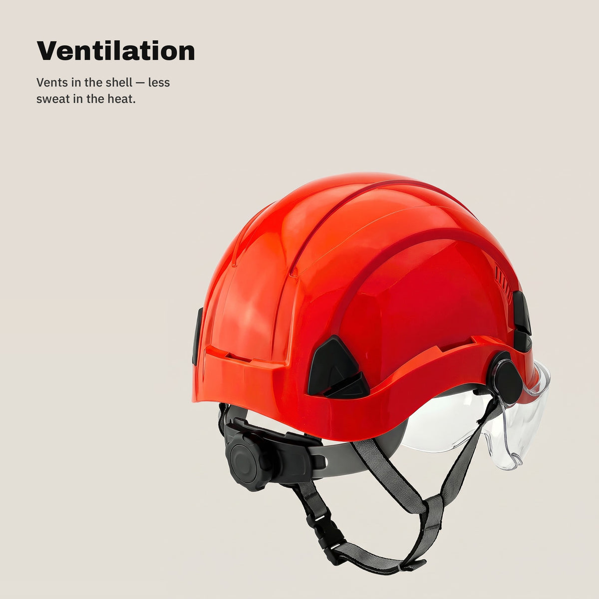 Ventilation slots in the shell of the red safety helmet