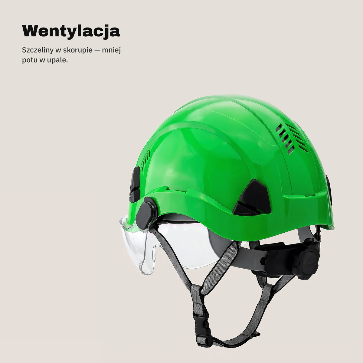 Szczeliny wentylacyjne w skorupie zielonego kasku ochronnego